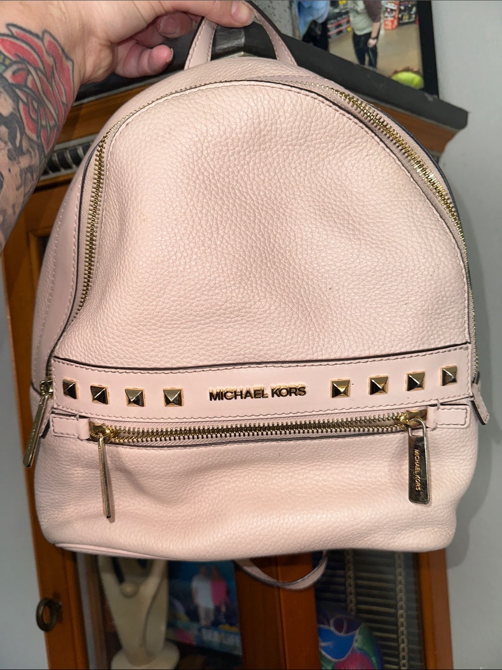 Michael Kors Pale Pink Pebbled Leather Mini Backpack with Gold Studs